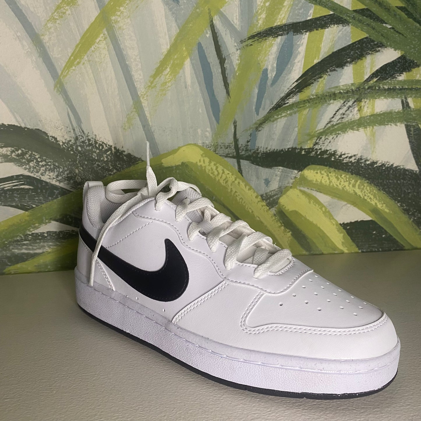 Nike Court borought low